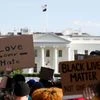 Demonstrators gather to protest the death of George Floyd, near the White House in Washington