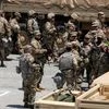 Members of California National Guard are seen at a parking lot near Los Angeles Convention Center