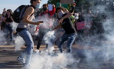 US officials block police 'extreme tactics' as protests enter 12th day George Floyd, US violence