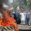 Demonstrators burn a tyre and block Jammu-Poonch highway during a protest against China on Indo-China clash at Galwan valley in Ladakh, in Jammu