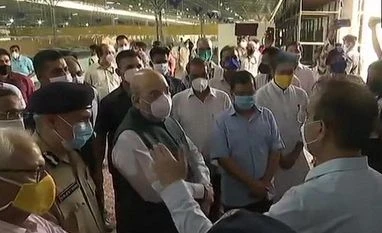 Shah, Kejriwal visit Delhi's 10,000-bed Covid facility, review arrangements Amit Shah, Kejriwal