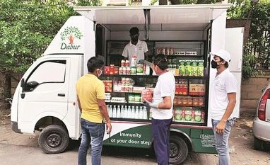 Dabur India's consolidated net profit rises 34.4% in Q4 on low base Dabur, FMCG