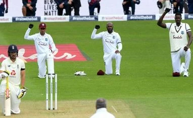 England, West Indies take a knee ahead of 1st cricket test at Ageas Bowl Black Lives Matter: England and West Indies cricketers take a knee