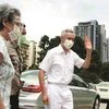 Singapore’s PM Lee Hsien Loong and his wife Ho Ching at a polling station during the general election on Friday	Reuters