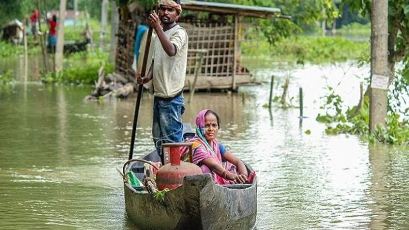 assam, floods, women assam, floods, women