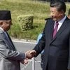 File photo of Nepal PM K P Sharma Oli (left) wih Chinese President Xi Jinping