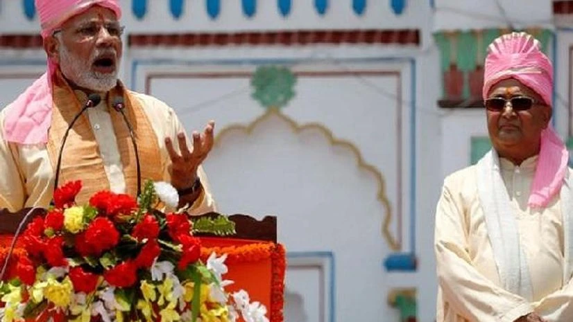 Prime Minister Narendra Modi, Nepal's Prime Minister Khadga Prasad Sharma Oli Prime Minister Narendra Modi speaks with the media as Nepal's Prime Minister Khadga Prasad Sharma Oli stands next to him during his visit at Janaki Mandir on May 11, 2018. Photo: Reuters