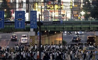 Australia's Victoria state imposes curfew in Melbourne; reports 429 cases Busy crossing in Japan