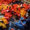 A child works at a toy factory (Photo: Bloomberg).