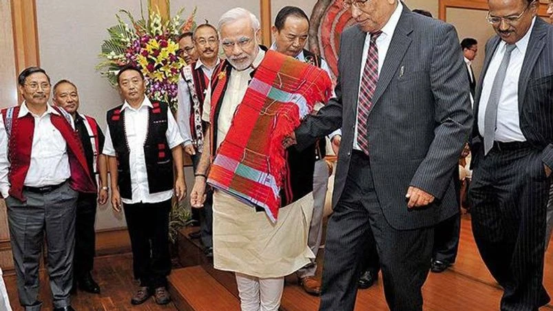 Narendra Modi, NSCN-IM general secretary Thuingaleng Muivah PM Narendra Modi with NSCN-IM general secretary Thuingaleng Muivah at the signing ceremony of Framework Agreement in 2015. Photo: PTI