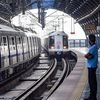 A metro train arrives at a platform. Photo: PTI