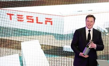 Tesla's quarterly report could land Elon Musk another $3 billion Elon Musk, Tesla