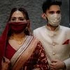 A face mask for the bride and the groom in colour coordinated hues of red and white. Source: The Wedding Files
