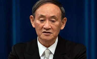 BOJ to hold fire, signal resolve to work closely with Suga's new cabinet Yoshihide Suga