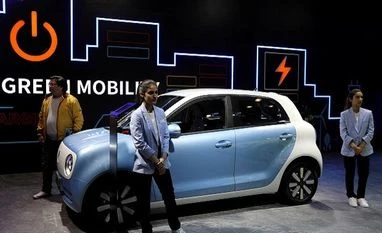 General Motors Co swings to profit, raises full-year outlook General Motors