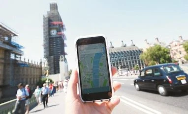 Uber under pressure on UK minimum wage in test of gig economy Uber