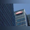 Drugmaker Takeda's CEO Weber to step down, raises profit forecast Takeda