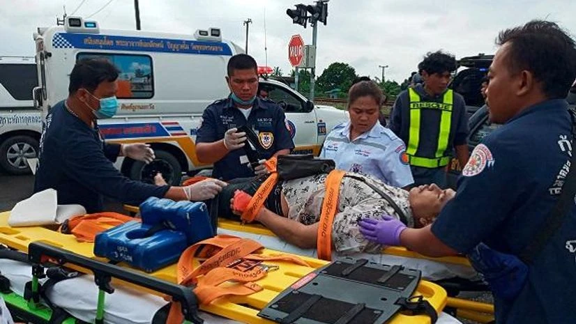 thailand, crash, collision, accident, train, bus, rescue workers thailand, crash, collision, accident, train, bus, rescue workers