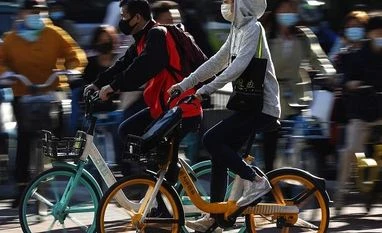 China says population grew in last year after report of decline coronavirus