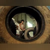 factory, labour., employment, job A worker retreads a used rubber tyre at a workshop in Agartala. Photo: Reuters