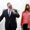 Secretary of State Mike Pompeo, and his wife Susan disembark from an aircraft upon their arrival at the airport in New Delhi