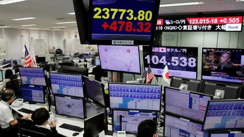 markets, global markets, stocks A monitor shows Nikkei stock index at a foreign exchange trading company in Tokyo, Japan. Photo: Reuters
