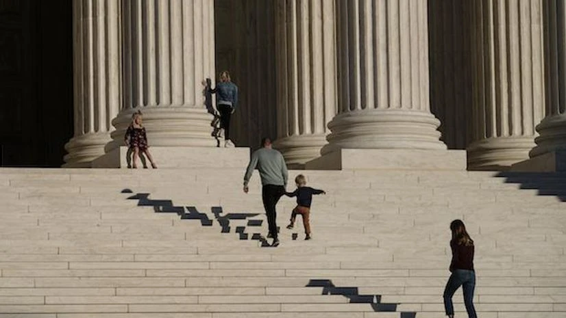US Elections, US, elections, A family visits the Supreme Court in Washington, Wednesday, Nov. 4, 2020 | (AP Photo/J. Scott Applewhite)