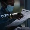 An election official counts absentee ballots for the 2020 Presidential election at State Farm Arena in Atlanta, Georgia. Photo: Bloomberg