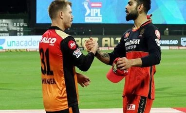 Williamson is SRH's banker, plays the pressure innings, says David Warner David Warner and Virat Kohli after IPL 2020 eliminator match on Friday