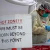 A healthcare worker prepares specimen collection tubes at a coronavirus disease (COVID-19) drive-thru testing location in Houston, Texas. Photo: Reuters