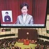 Hong Kong's Carrie Lam vows closer Beijing ties to revive economy