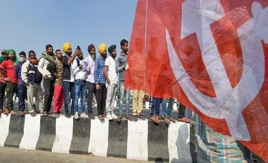 Highways blocked, protests spread: 10 headlines from farmers' Bharat Bandh Farmers near Gazipur border, farmers protest, CPM flag