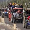 Farmers and their supporters take part in a tractor rally during a protest to support the nationwide strike, called by farmer unions to press for repeal of the Centres Agri laws, in Amritsar, Tuesday, Dec. 8, 2020. (PTI Photo)