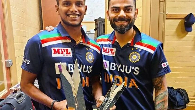 T Natarajan with skipper Virat Kohli after India vs Australia limited-overs series T Natarajan with skipper Virat Kohli after India vs Australia limited-overs series