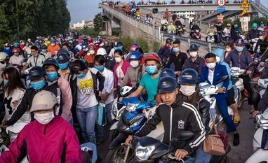 Economic impact from rising Covid cases in China controllable: Stats Bureau Economy