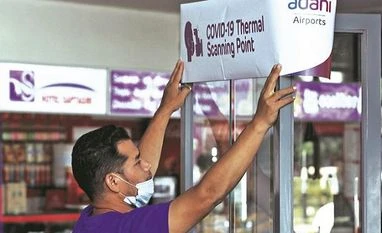 52-year-old UK returnee tests positive for coronavirus in Jabalpur Adani Enterprises, Covid, coronavirus, airport