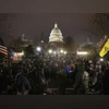 US Capitol Hill Law enforcement officers guard the U.S. Capitol building after demonstrators earlier stormed the building on Jan. 6. Photographer: Victor J. Blue/Bloomberg