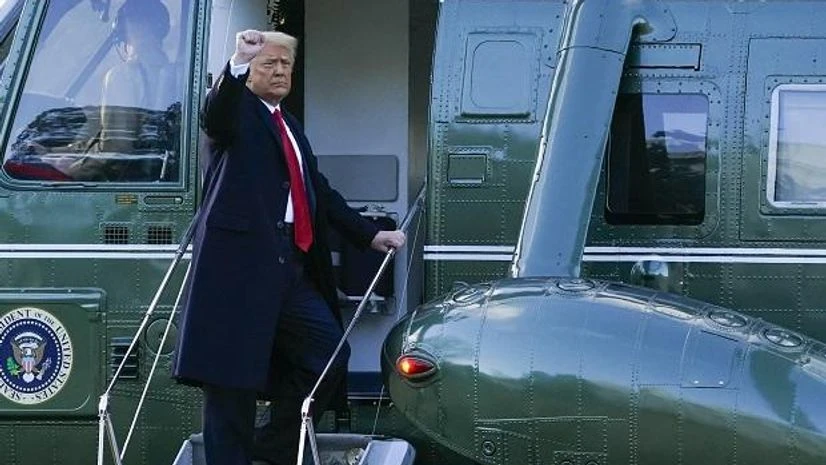 Donald Trump President Donald Trump gestures as he boards Marine One on the South Lawn of the White House, Wednesday, Jan. 20, 2021, in Washington. Trump is en route to his Mar-a-Lago Florida Resort. (AP Photo/Alex Brandon)