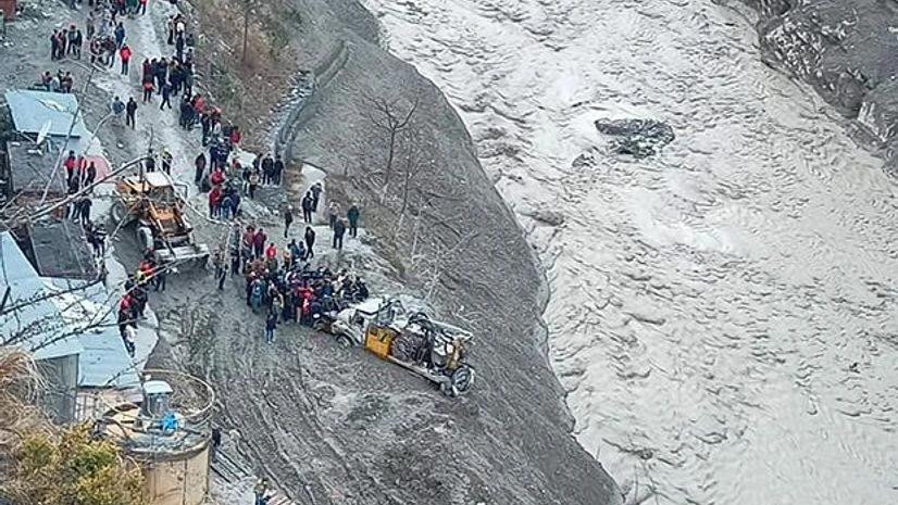 Uttarakhand flood, flash flood, Chamoli flood Rescue operations underway near Dhauliganga hydropower project after a glacier broke off in Joshimath causing a massive flood in the Dhauliganga river, in Chamoli district of Uttarakhand. Photo: PTI