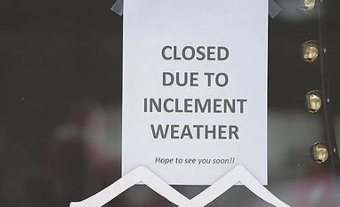 Several companies freeze operations as severe weather disrupts parts of US US weather