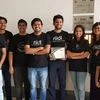 Gaurang Shetty, Chief Innovation Catalyst and CEO at riidl (Centre, with certificate) and other team members