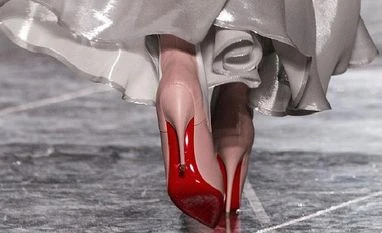 Italy's Agnelli family expands in luxury with 24% stake in Louboutin Louboutin