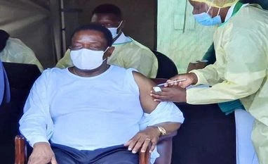 Zimbabwe's president gets first shot of China's Sinovac coronavirus vaccine Zimbabwe President