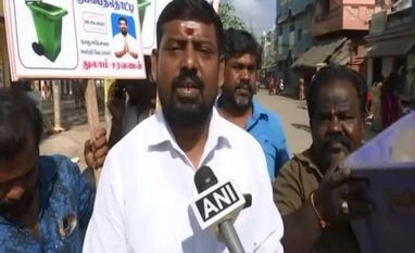 TN polls: Madurai South Independent candidate promises trip to Moon, robots Thulam Saravanan, Madurai south independent candidate, TN polls