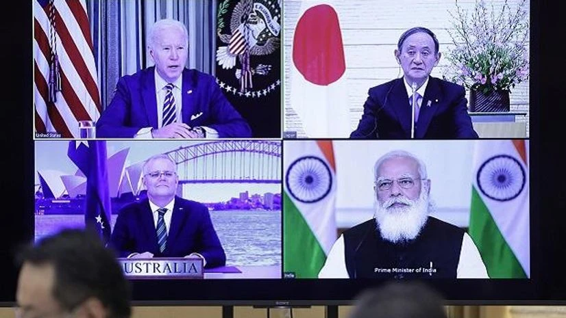 Biden, Suga, Morrison, Modi Joe Biden, top left, Yoshihide Sug, top right, Scott Morrison, bottom left, and Narendra Modi, during the virtual Quadrilateral Security Dialogue (Quad) meeting on March 12.