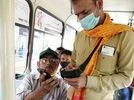 public transport A passenger and bus conductor using Chalo’s ‘Sound QR’, an ultrasonic sound technology for verification of mobile tickets
