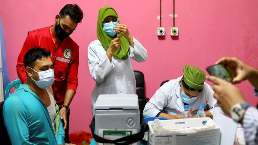 bangladesh vaccination A man waits to get vaccinated with an injection of the Covishield at the Dhaka Medical College vaccination centre in Dhaka (Photo: Reuters)