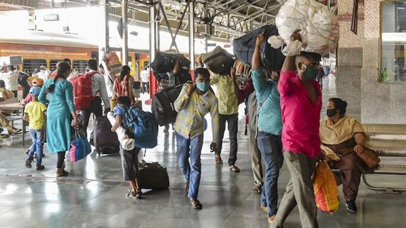 Migrants, Indian Railways, coronavirus Passengers from Mumbai arrive via CST Gorakhpur special train, at Charbagh Railway Station in Lucknow (Photo: PTI)