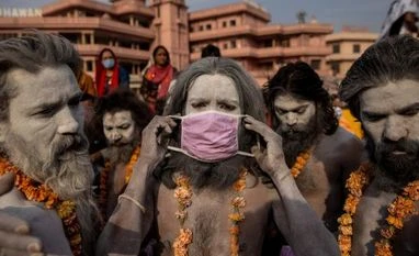 Kumbh Mela: Thousands take dip in Ganga amid rising Covid cases Naga sadhus
