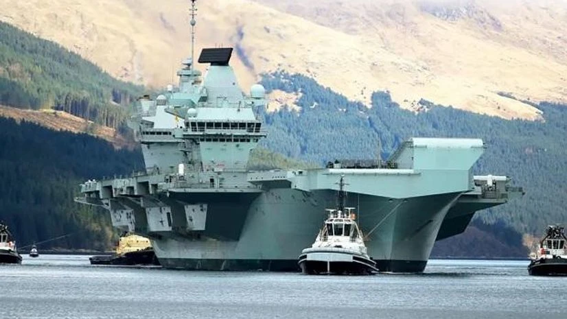 Royal Navy The aircraft carrier strike group, led by Royal Navy’s flagship HMS Queen Elizabeth, will embark on its first operational voyage next month to Indian Ocean and the South China Sea